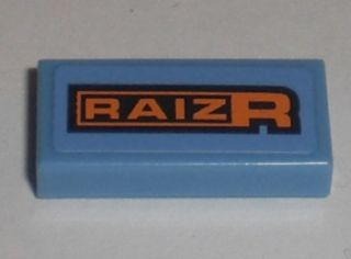 Light blue LEGO 1x2 tile with orange and black 'RAIZR' pattern.