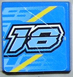 Blue LEGO 2x2 tile with a light blue number '18' outlined in black and dark blue, featuring two yellow diagonal lines and subtle background patterns.
