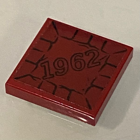 Dark red LEGO 2x2 tile with '1962' pattern and stylized cracks. Part 3068pb1475, from Set 76057.