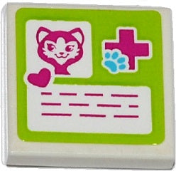 LEGO 2x2 white tile with lime green border, featuring a pink cat head, magenta heart, magenta cross with blue paw print, and magenta lines.