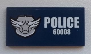 Dark blue LEGO 2x4 tile with a silver winged star badge and white text 'POLICE 60008'.