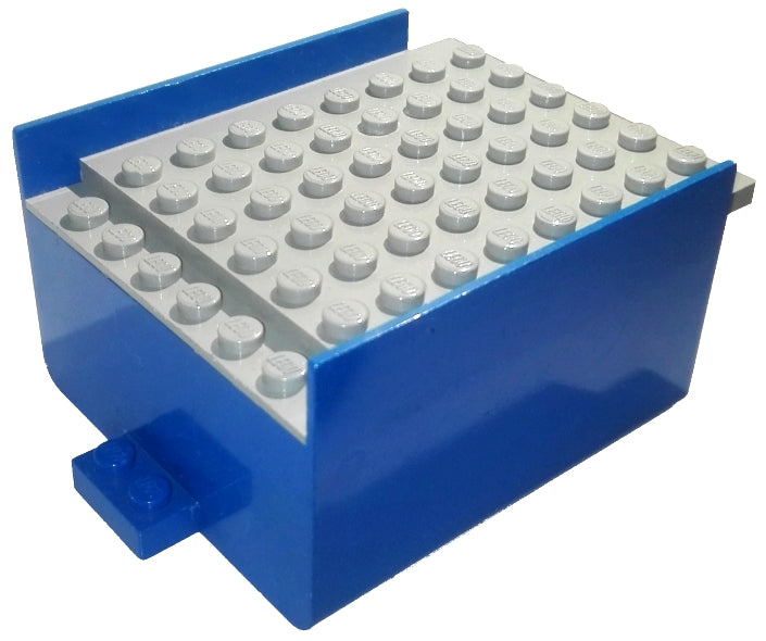 LEGO x146c01 boat hull, smooth middle, 8x6x3 1/3, blue with a light gray deck, viewed from an angle.