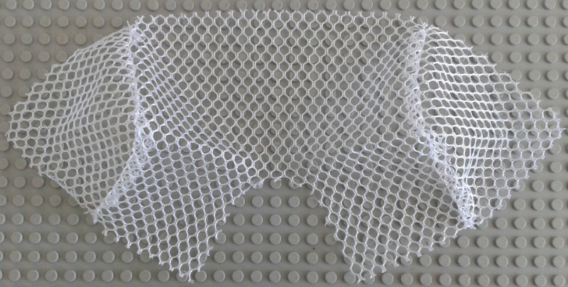 White LEGO x386 string soccer goal net with a cutout, featuring a mesh pattern, on a gray studded baseplate.